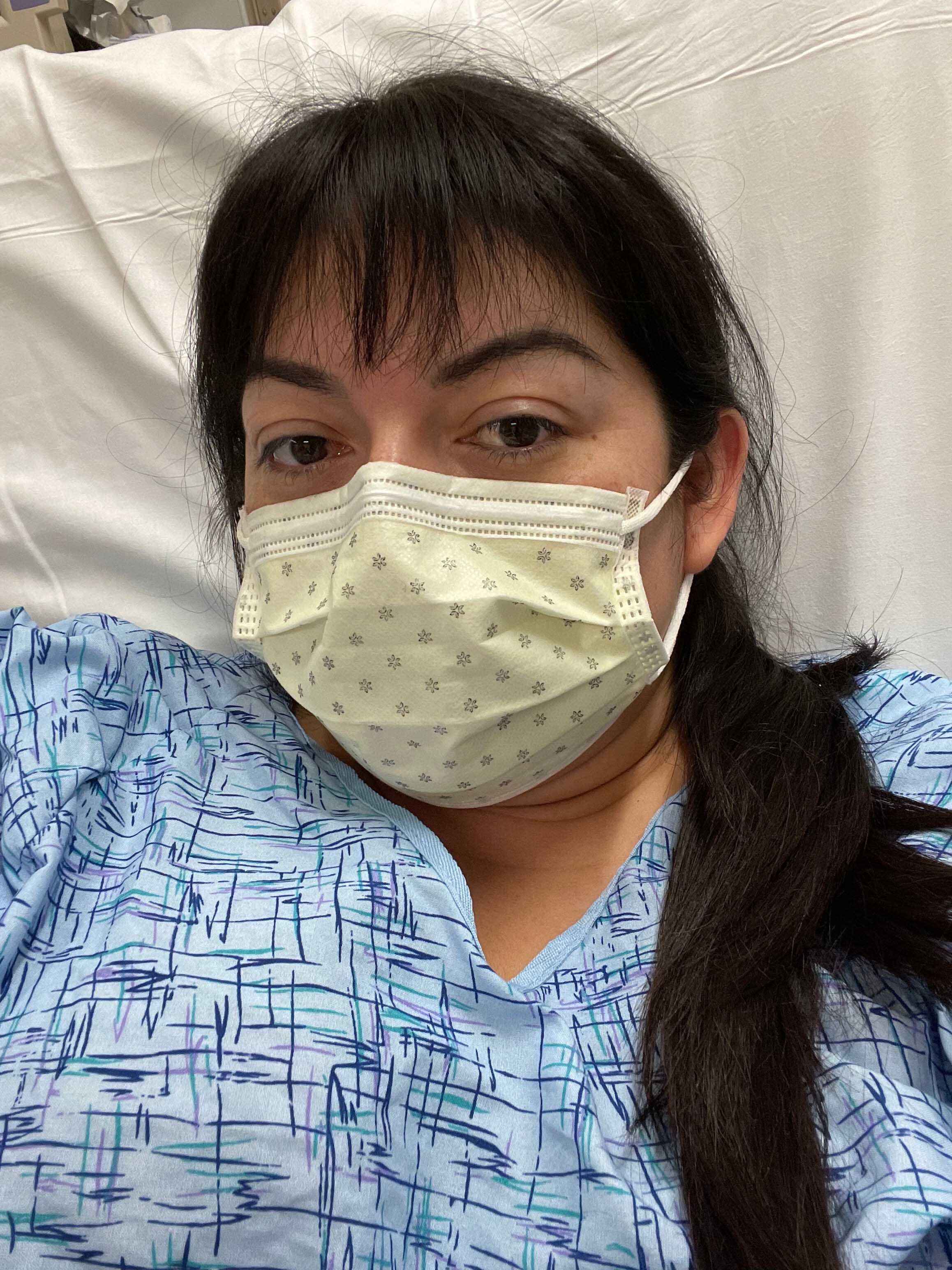 Cindy Urbina in a hospital bed