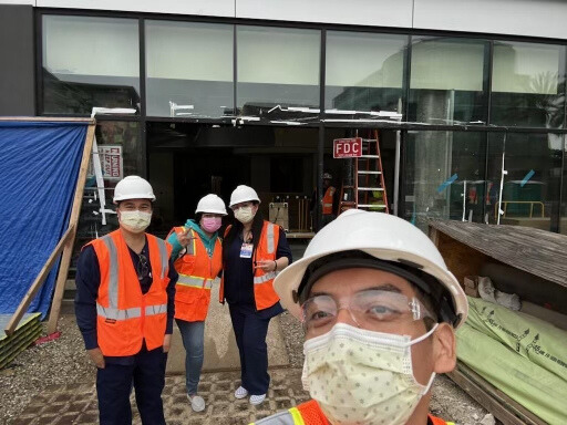 Cindy Urbina and colleagues standing in front of the new patient tower