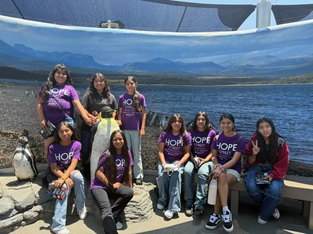 Summer of Science participants in a group photo at the Aquarium of the Pacific